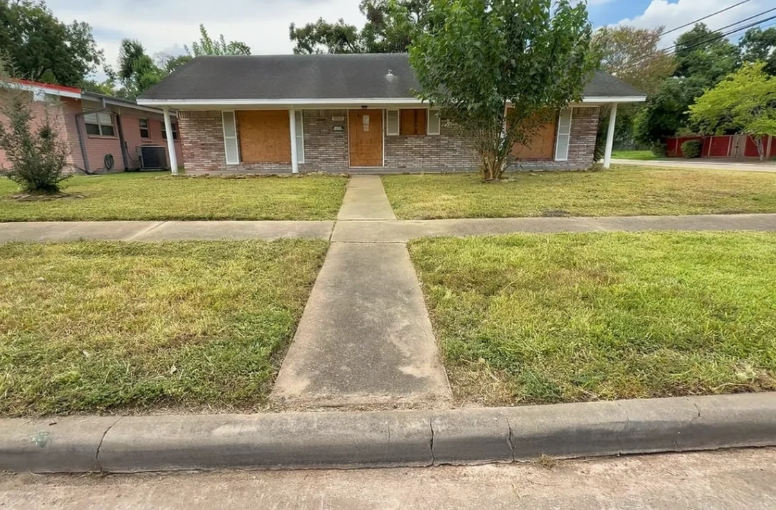 lawn care aiken sc after — clean mowed lawn with clear walkway and tidy curb appeal
